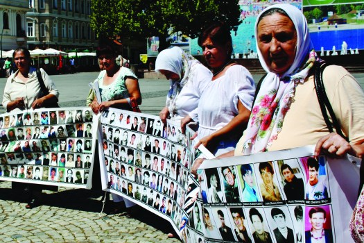 On the 11th of each month the Women of Srebrenica gather in the main square of Tuzla to stand in silent protest of their missing and dead men_Cl.jpg